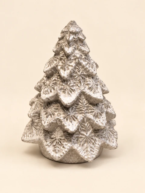 Christmas tree with layered branches and a raised leaf pattern in light and silver tones