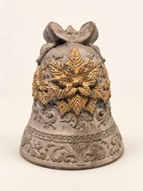Grey and gold Christmas bell with a bow, a raised flower, leaves and a curved decorative pattern